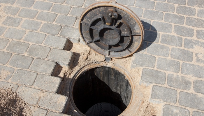 https://callchampionservices.com/wp-content/uploads/sewer-drain-open-hole.jpg